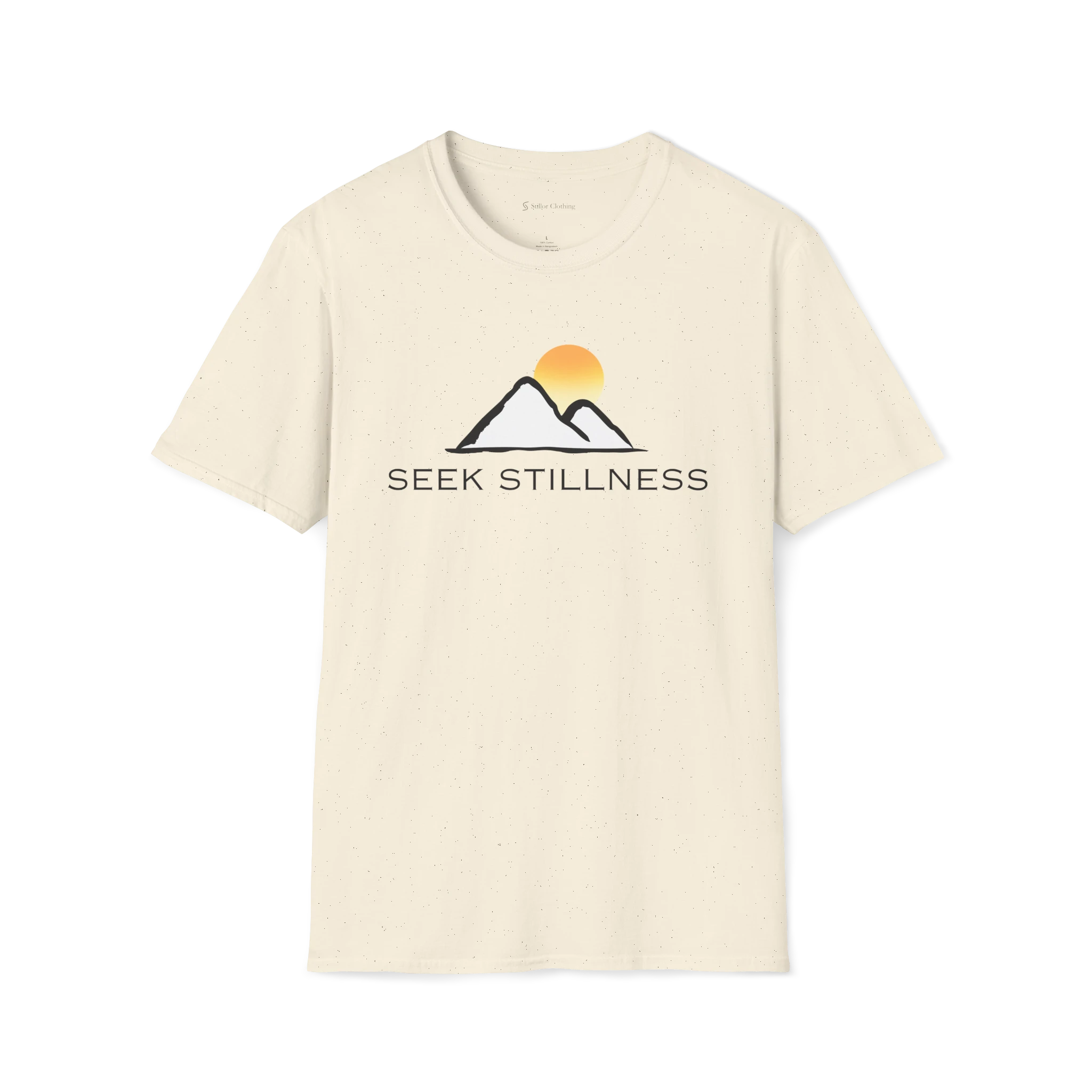 Beige Seek Stillness t-shirt, front view with mountain line art and rising sun graphic.