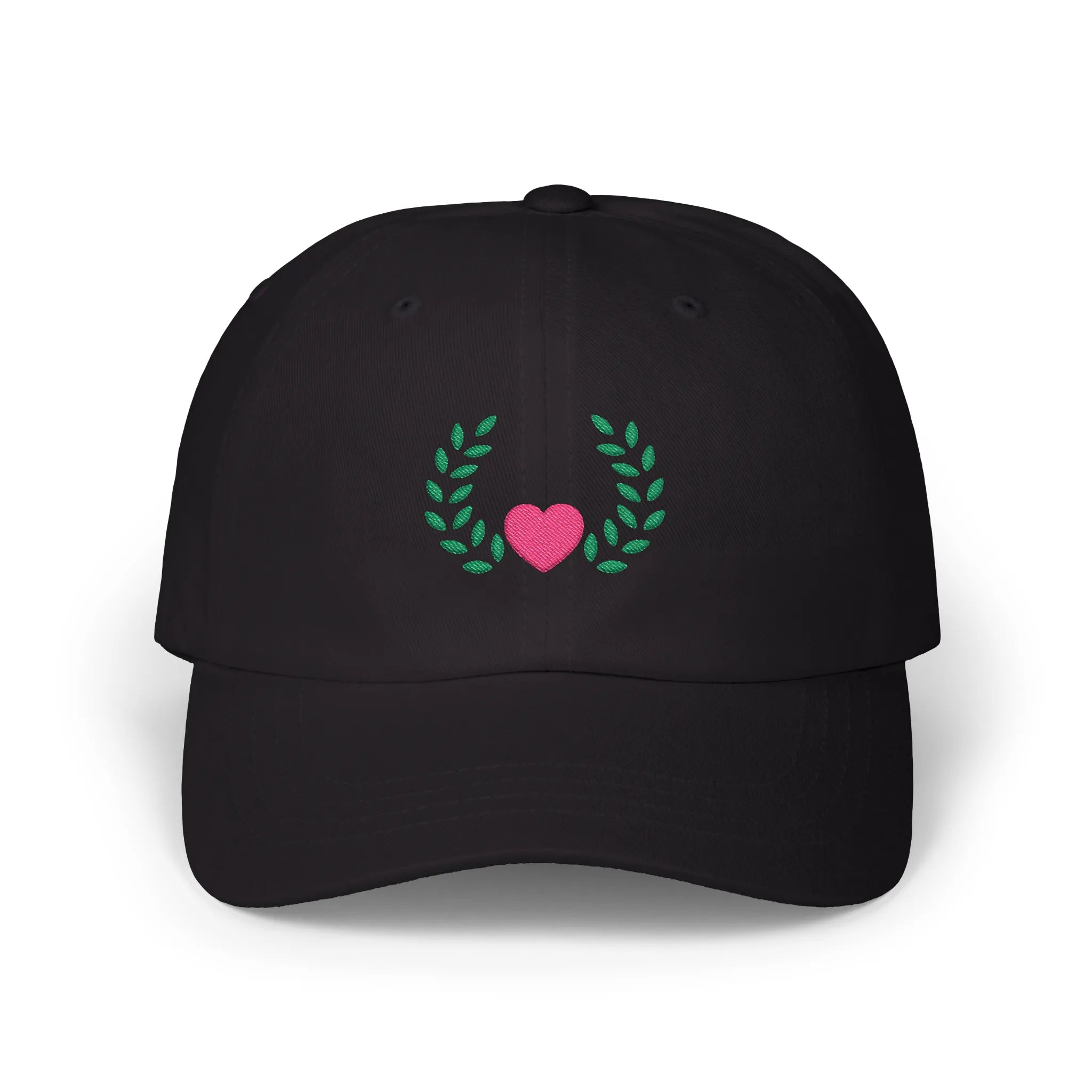 Black heart and leaves baseball cap, front view with pink heart framed by green leaf branches