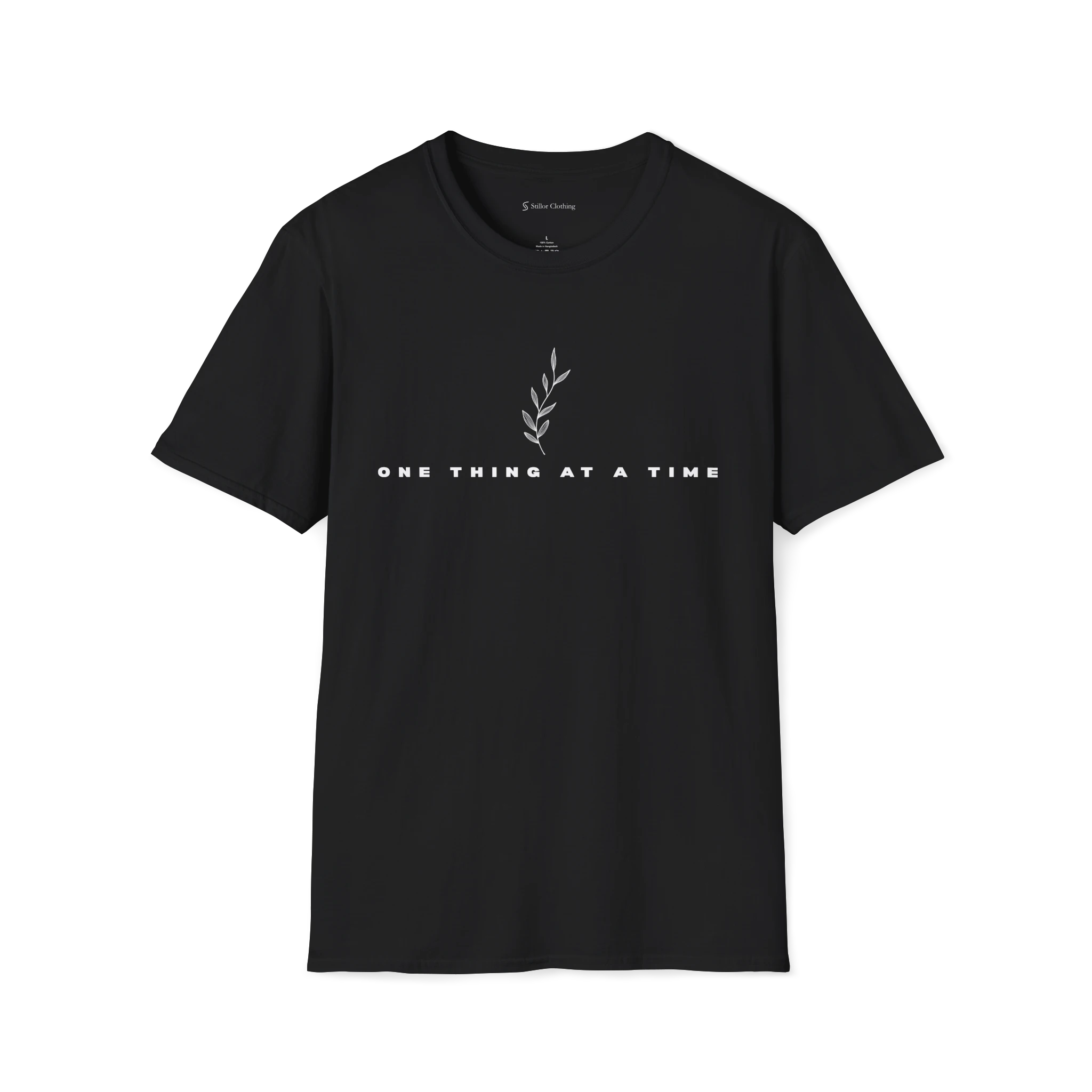 Black One Thing At A Time T-shirt, front view with minimalist leaf artwork and centered text print