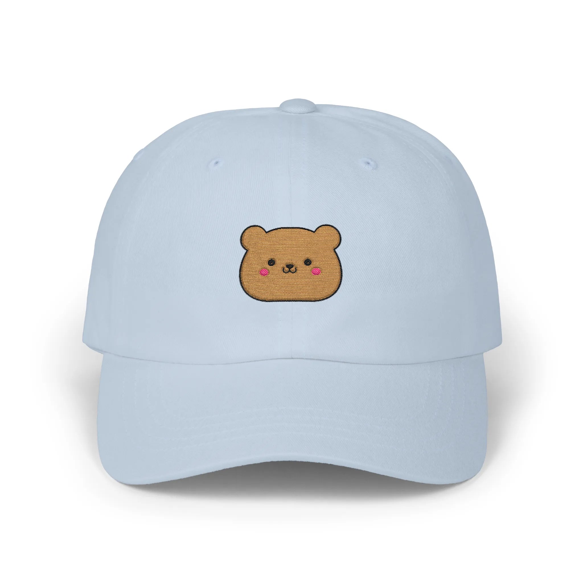 Light Blue happy teddy baseball cap, front view with brown teddy face embroidery and pink cheeks