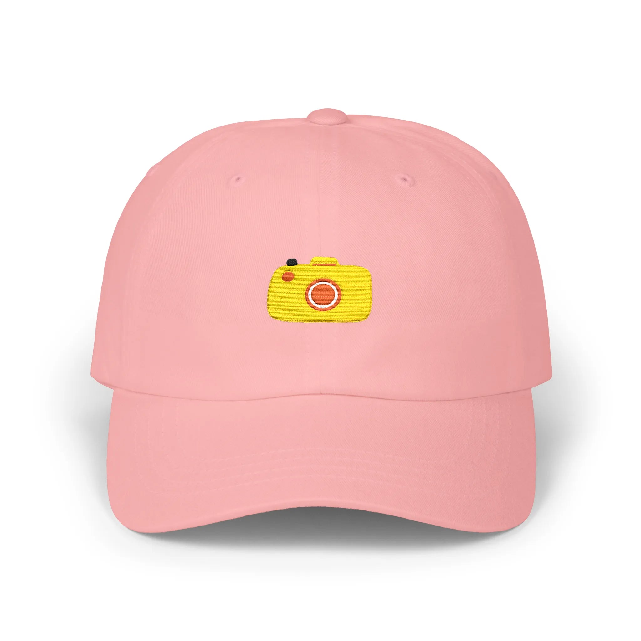 Pink capture baseball cap, front view with yellow camera embroidery and orange lens