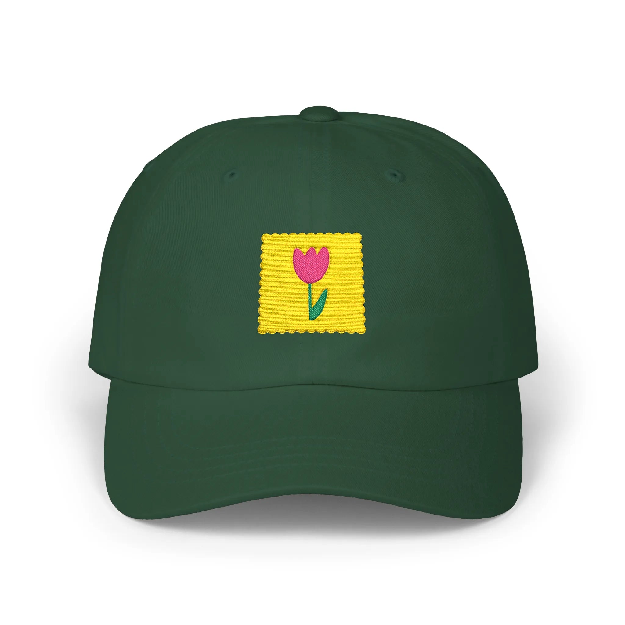 Spruce flower stamp baseball cap, front view with yellow stamp patch and pink flower embroidery