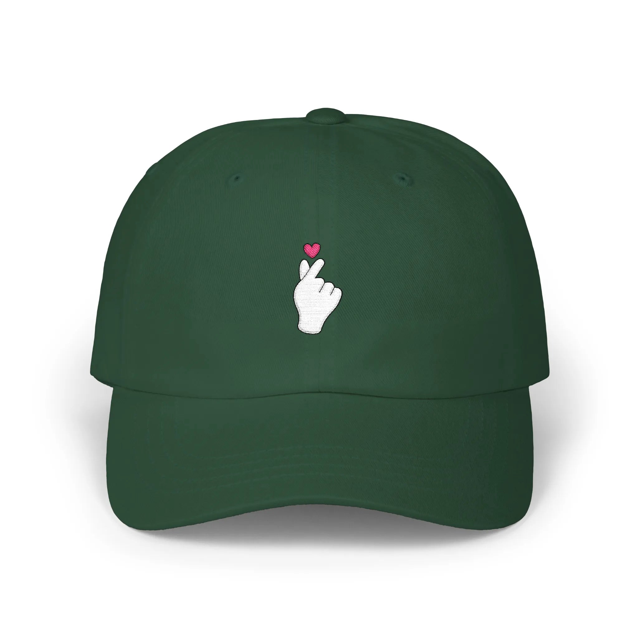 Spruce Sarange baseball cap, front view with Korean finger heart embroidery and small pink heart