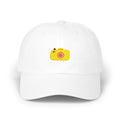 White capture baseball cap, front view with yellow camera embroidery and orange lens