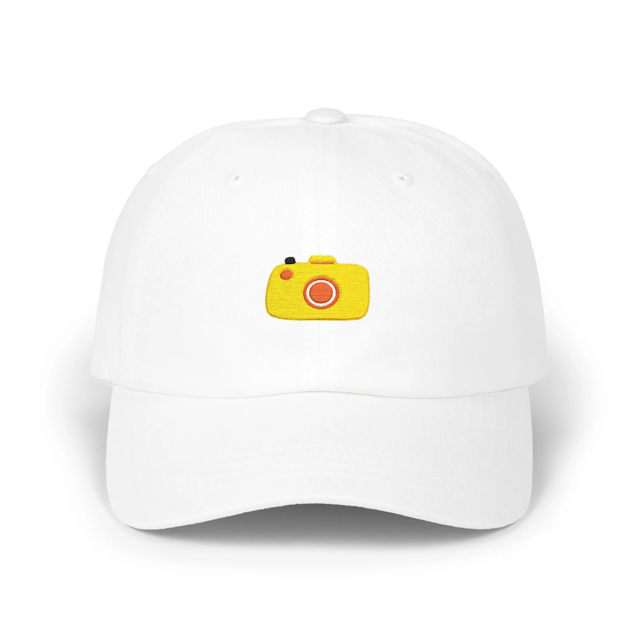 White capture baseball cap, front view with yellow camera embroidery and orange lens