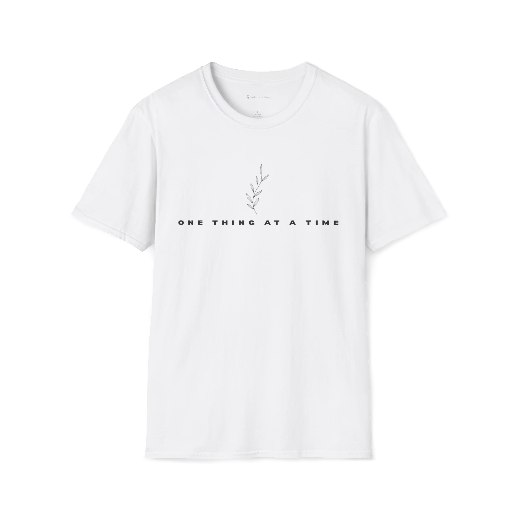 White One Thing At A Time T-shirt, front view with minimalist leaf artwork and centered text print