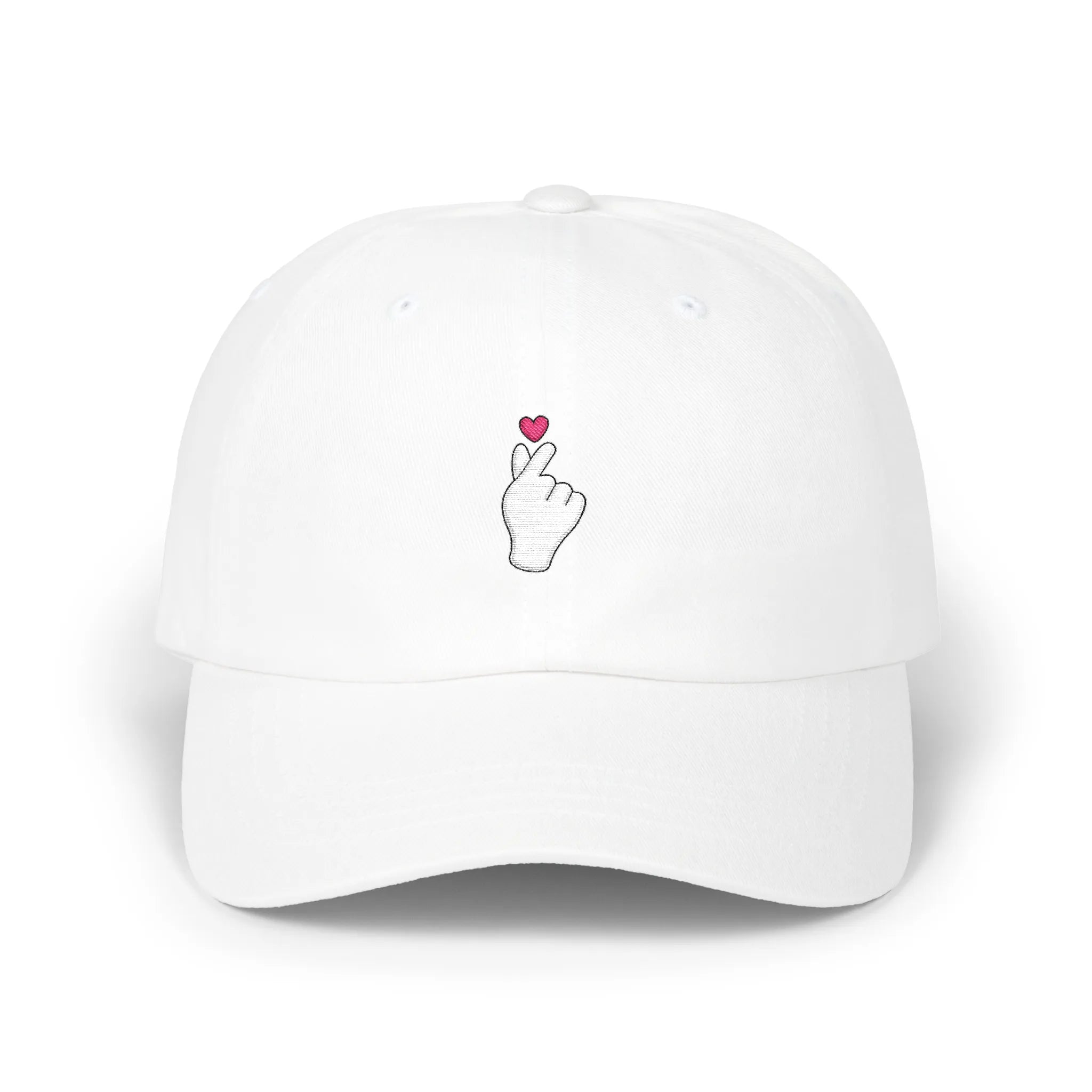 White Sarange baseball cap, front view with Korean finger heart embroidery and small pink heart